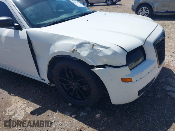 2009 Chrysler 300 Touring with VIN 2C3KA53V89H634048, listed as a IAAI auction lot 41974629 with Not Provided miles and . Bid and sale history available at DreamBid. Image 6.