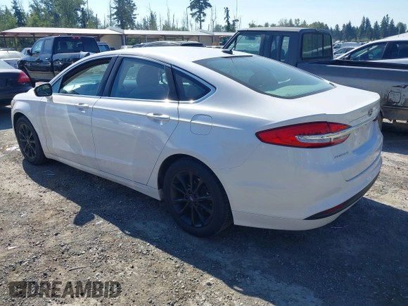 2017 Ford Fusion SE z VIN 3FA6P0HD3HR132779, wystawiony jako IAAI lot #42690212 z przebiegiem 165 293 mil mil oraz . Historia ofert i sprzedaży dostępna na DreamBid. Obrazek 3.