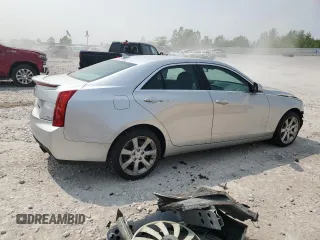 2013 Cadillac ATS z VIN 1G6AG5RXXD0125335, wystawiony jako Copart lot #59125695 z przebiegiem Nie podano mil oraz Czysty tytuł • Clean title. Historia ofert i sprzedaży dostępna na DreamBid. Obrazek 3.