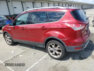 2015 Ford Escape Titanium with VIN 1FMCU0JX8FUC03874, listed as a Copart auction lot 61259665 with 98,933 mi miles and Salvage title. Bid and sale history available at DreamBid. Image 2.