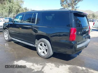 2017 Chevrolet Suburban LS z VIN 1GNSCGKC1HR338621, wystawiony jako IAAI lot #41696381 z przebiegiem 194 687 mil mil oraz . Historia ofert i sprzedaży dostępna na DreamBid. Obrazek 3.