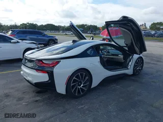 2015 BMW i8 with VIN WBY2Z2C51FV392661, listed as a IAAI auction lot 38409147 with 79,082 mi miles. Bid and sale history available at carsss.com. Image 4.