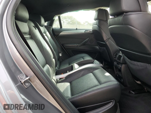 2012 BMW X6 50i z VIN 5UXFG8C53CL590367, wystawiony jako Copart lot #86650664 z przebiegiem Nie podano mil oraz Szkoda całkowita • Salvage title. Historia ofert i sprzedaży dostępna na DreamBid. Obrazek 12.