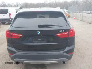 2017 BMW X1 xDrive28i with VIN WBXHT3C31H5F72958, listed as a IAAI auction lot 41782257 with 134,829 mi miles. Bid and sale history available at carsss.com. Image 16.