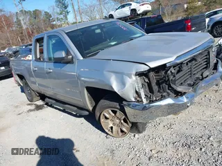 2019 Chevrolet Silverado 1500 LT with VIN 2GCRCPEC6K1155556, listed as a IAAI auction lot 41034151 with 104,669 mi miles and . Bid and sale history available at DreamBid. Image 1.