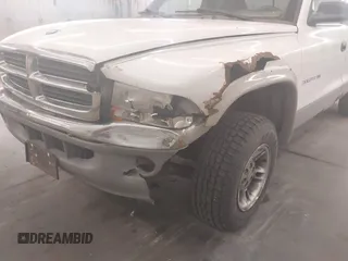 1999 Dodge Dakota SLT with VIN 1B7GG22XXXS254782, listed as a IAAI auction lot 41847644 with 164,607 mi miles and . Bid and sale history available at carsss.com. Image 6.