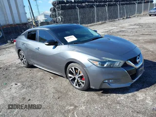 2016 Nissan Maxima Platinum with VIN 1N4AA6AP1GC379945, listed as a IAAI auction lot 41673505 with 119,884 mi miles and . Bid and sale history available at DreamBid. Image 1.