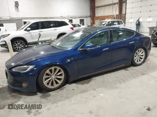 2018 Tesla Model S 75D with VIN 5YJSA1E24JF257817, listed as a IAAI auction lot 41960439 with 61,971 mi miles and . Bid and sale history available at DreamBid. Image 2.