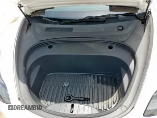 2023 Tesla Model 3 z VIN 5YJ3E1EAXPF600008, wystawiony jako Copart lot #61063675 z przebiegiem 58 733 mil mil oraz Szkoda całkowita • Salvage title. Historia ofert i sprzedaży dostępna na DreamBid. Obrazek 11.