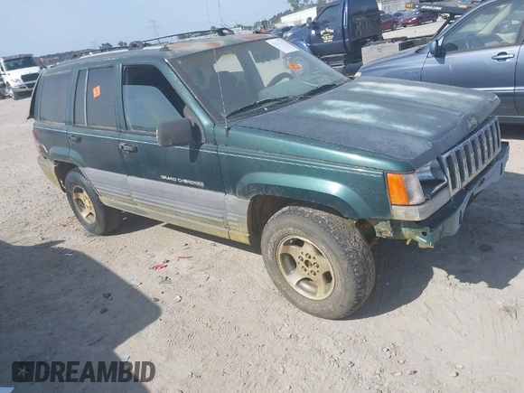 1996 Jeep Grand Cherokee Laredo with VIN 1J4FX58S9TC300710, listed as a IAAI auction lot 42073391 with 1 mi miles. Bid and sale history available at carsss.com. Image 1.