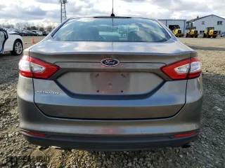 2014 Ford Fusion S with VIN 3FA6P0G78ER121784, listed as a Copart auction lot 52357145 with 114,851 mi miles and Salvage Title. Bid and sale history available at carsss.com. Image 6.