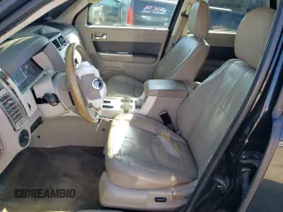 2011 Mercury Mariner Premier with VIN 4M2CN8HG3BKJ00612, listed as a Copart auction lot 53490645 with 154,119 mi miles and Salvage title. Bid and sale history available at DreamBid. Image 7.