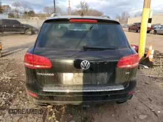 2012 Volkswagen Touareg Sport z VIN WVGEF9BP7CD006020, wystawiony jako Copart lot #88211145 z przebiegiem 180 729 mil mil oraz Szkoda całkowita • Salvage title. Historia ofert i sprzedaży dostępna na DreamBid. Obrazek 6.