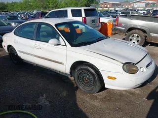 1998 Ford Taurus LX z VIN 1FAFP52U5WA226756, wystawiony jako IAAI lot #42100830 z przebiegiem 222 426 mil mil oraz . Historia ofert i sprzedaży dostępna na DreamBid. Obrazek 1.