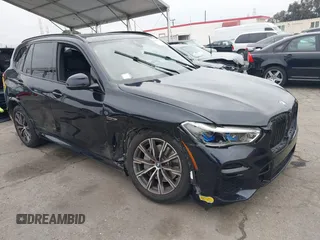 2022 BMW X5 xDrive45e with VIN 5UXTA6C08N9L09645, listed as a IAAI auction lot 41454157 with 31,149 mi miles. Bid and sale history available at carsss.com. Image 1.