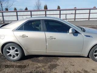 2009 Cadillac CTS AWD z VIN 1G6DT57V990107958, wystawiony jako IAAI lot #41685415 z przebiegiem 148 294 mil mil oraz . Historia ofert i sprzedaży dostępna na DreamBid. Obrazek 14.