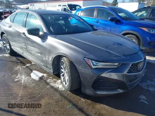 2021 Acura TLX with VIN 19UUB5F33MA005656, listed as a IAAI auction lot 41435469 with 56,691 mi miles and . Bid and sale history available at DreamBid. Image 1.