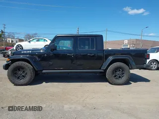 2022 Jeep Gladiator Texas Trail with VIN 1C6HJTAG2NL120506, listed as a IAAI auction lot 42048215 with 65,048 mi miles. Bid and sale history available at carsss.com. Image 13.