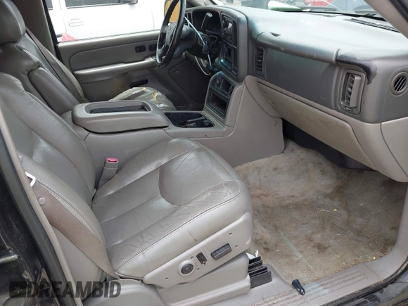 2004 Chevrolet Tahoe LT with VIN 1GNEC13Z14R203713, listed as a IAAI auction lot 42490743 with 216,529 mi miles and . Bid and sale history available at DreamBid. Image 5.