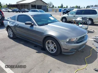 2011 Ford Mustang V6 with VIN 1ZVBP8AMXB5105751, listed as a IAAI auction lot 42104899 with 70,178 mi miles and . Bid and sale history available at DreamBid. Image 1.