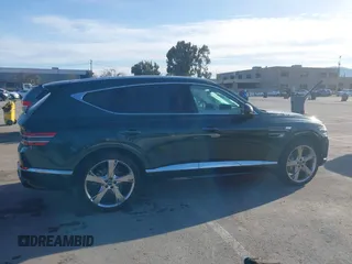 2021 Genesis GV80 with VIN KMUHCESCXMU046641, listed as a IAAI auction lot 41614756 with 25,666 mi miles and . Bid and sale history available at DreamBid. Image 14.