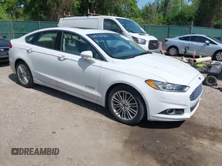 2013 Ford Fusion SE Hybrid with VIN 3FA6P0LU4DR337674, listed as a IAAI auction lot 42164262 with 150,902 mi miles and . Bid and sale history available at carsss.com. Image 1.