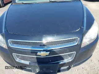 2011 Chevrolet Malibu 1LS with VIN 1G1ZB5E17BF241076, listed as a IAAI auction lot 41996747 with 305,362 mi miles and . Bid and sale history available at DreamBid. Image 6.