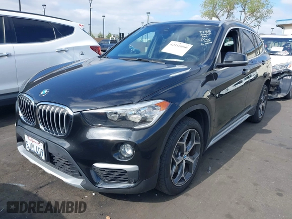 2019 BMW X1 sDrive28i with VIN WBXHU7C59K5L12320, listed as a IAAI auction lot 42116860 with 28,183 mi miles and . Bid and sale history available at DreamBid. Image 18.