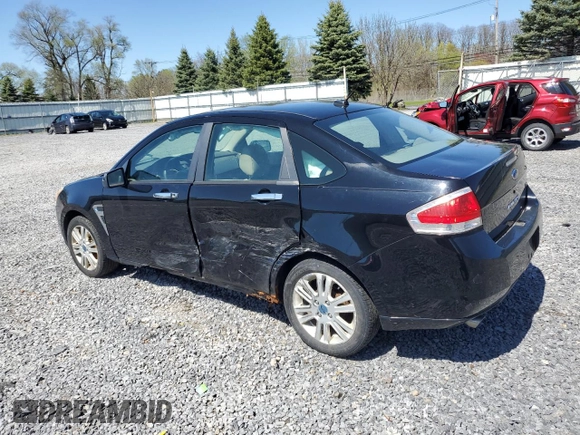 2008 Ford Focus SE with VIN 1FAHP35N08W191020, listed as a Copart auction lot 54902305 with 146,232 mi miles and Salvage Title. Bid and sale history available at carsss.com. Image 2.