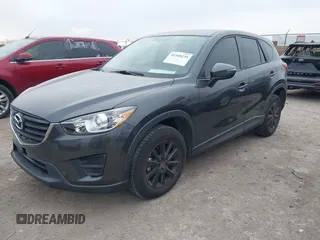 2016 Mazda CX-5 Sport with VIN JM3KE2BY4G0858100, listed as a IAAI auction lot 41368135 with 93,435 mi miles. Bid and sale history available at carsss.com. Image 2.