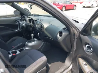 2014 Nissan Juke SL with VIN JN8AF5MV3ET359021, listed as a IAAI auction lot 42602201 with 99,332 mi miles and . Bid and sale history available at DreamBid. Image 5.