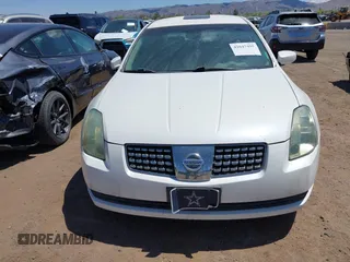 2004 Nissan Maxima SE with VIN 1N4BA41E44C882288, listed as a IAAI auction lot 42047495 with 323,753 mi miles. Bid and sale history available at carsss.com. Image 6.