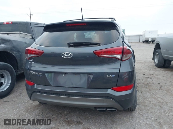 2016 Hyundai Tucson Sport with VIN KM8J33A26GU189300, listed as a IAAI auction lot 41372422 with 94,848 mi miles. Bid and sale history available at carsss.com. Image 15.