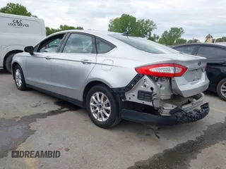 2016 Ford Fusion S z VIN 3FA6P0G76GR155001, wystawiony jako IAAI lot #42158562 z przebiegiem 147 964 mil mil oraz . Historia ofert i sprzedaży dostępna na DreamBid. Obrazek 3.