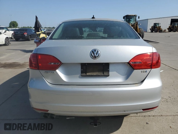2012 Volkswagen Jetta TDI w/Premium & Nav with VIN 3VWLL7AJ8CM349006, listed as a Copart auction lot 54934995 with 110,596 mi miles and Salvage title. Bid and sale history available at DreamBid. Image 6.