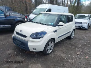 2010 Kia Soul + with VIN KNDJT2A2XA7034348, listed as a IAAI auction lot 42059954 with 252,878 mi miles. Bid and sale history available at carsss.com. Image 2.