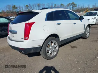 2015 Cadillac SRX Performance Collection with VIN 3GYFNFE35FS573814, listed as a IAAI auction lot 41770696 with 119,205 mi miles and . Bid and sale history available at DreamBid. Image 4.