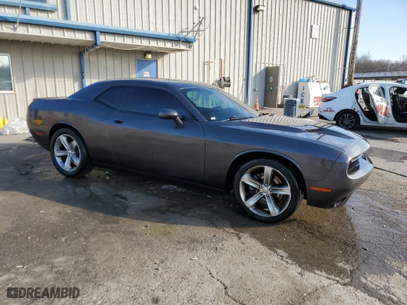 2016 Dodge Challenger R/T with VIN 2C3CDZBT7GH185476, listed as a Copart auction lot 88766985 with 120,072 mi miles and Salvage Title. Bid and sale history available at carsss.com. Image 4.