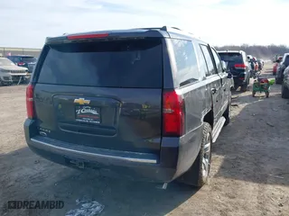 2016 Chevrolet Tahoe LTZ with VIN 1GNSKCKC7GR475458, listed as a IAAI auction lot 41831124 with 95,554 mi miles. Bid and sale history available at carsss.com. Image 4.