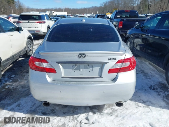 2013 Infiniti M z VIN JN1BY1AR6DM602407, wystawiony jako IAAI lot #41617455 z przebiegiem 99 195 mil mil oraz . Historia ofert i sprzedaży dostępna na DreamBid. Obrazek 16.