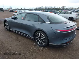 2023 Lucid Air Pure with VIN 50EA1PFA5PA007794, listed as a IAAI auction lot 42113156 with 5,052 mi miles. Bid and sale history available at carsss.com. Image 3.
