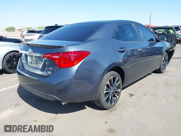 2019 Toyota Corolla L with VIN 2T1BURHE3KC207010, listed as a IAAI auction lot 42004596 with 106,188 mi miles and . Bid and sale history available at DreamBid. Image 4.