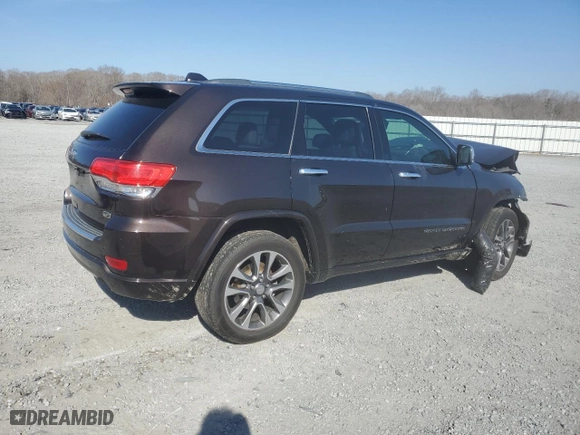 2017 Jeep Grand Cherokee Overland with VIN 1C4RJECG2HC712823, listed as a Copart auction lot 48063325 with 124,812 mi miles and Salvage Title. Bid and sale history available at carsss.com. Image 3.