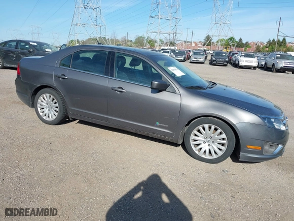2011 Ford Fusion Hybrid with VIN 3FADP0L34BR290335, listed as a IAAI auction lot 42094674 with 171,391 mi miles. Bid and sale history available at carsss.com. Image 1.