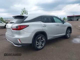 2018 Lexus RX 450hL Premium with VIN JTJDGKCA6J2003954, listed as a IAAI auction lot 42259774 with 93,706 mi miles and . Bid and sale history available at DreamBid. Image 4.