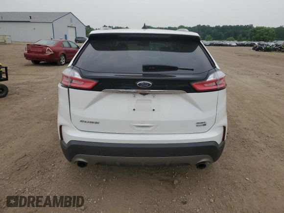2020 Ford Edge SEL z VIN 2FMPK4J95LBB21392, wystawiony jako Copart lot #60912275 z przebiegiem 82 527 mil mil oraz Szkoda całkowita • Salvage title. Historia ofert i sprzedaży dostępna na DreamBid. Obrazek 6.
