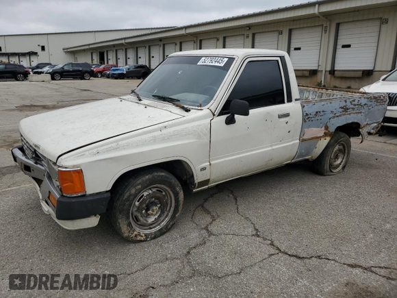 1988 Toyota Pickup z VIN JT4RN50R0J5122639, wystawiony jako Copart lot #52792445 z przebiegiem 233 407 mil mil oraz Szkody całkowita. Historia ofert i sprzedaży dostępna na DreamBid. Obrazek 1.