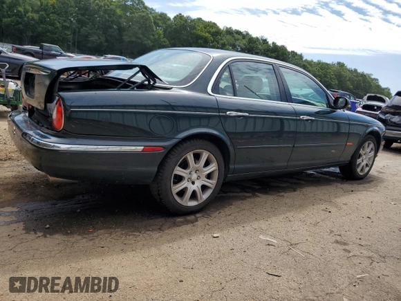 2004 Jaguar XJ with VIN SAJWA71C34SG16508, listed as a Copart auction lot 66751644 with 179,039 mi miles and Salvage Title. Bid and sale history available at carsss.com. Image 3.