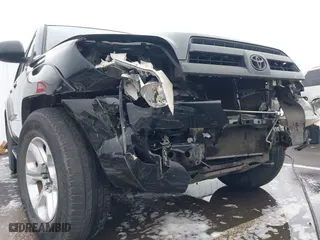 2005 Toyota 4Runner SR5 with VIN JTEBU14R950077268, listed as a IAAI auction lot 41588206 with 188,870 mi miles. Bid and sale history available at carsss.com. Image 6.