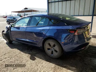 2022 Tesla Model 3 with VIN 5YJ3E1EA9NF288499, listed as a Copart auction lot 52202955 with 86,372 mi miles and Clean Title. Bid and sale history available at DreamBid. Image 2.